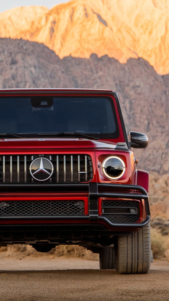 Red and Black Car on Brown Dirt Road During Daytime. Wallpaper in 720x1280 Resolution