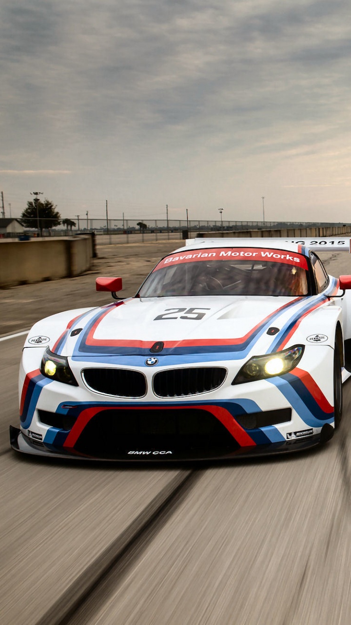 White and Red Bmw m 3 on Track. Wallpaper in 720x1280 Resolution