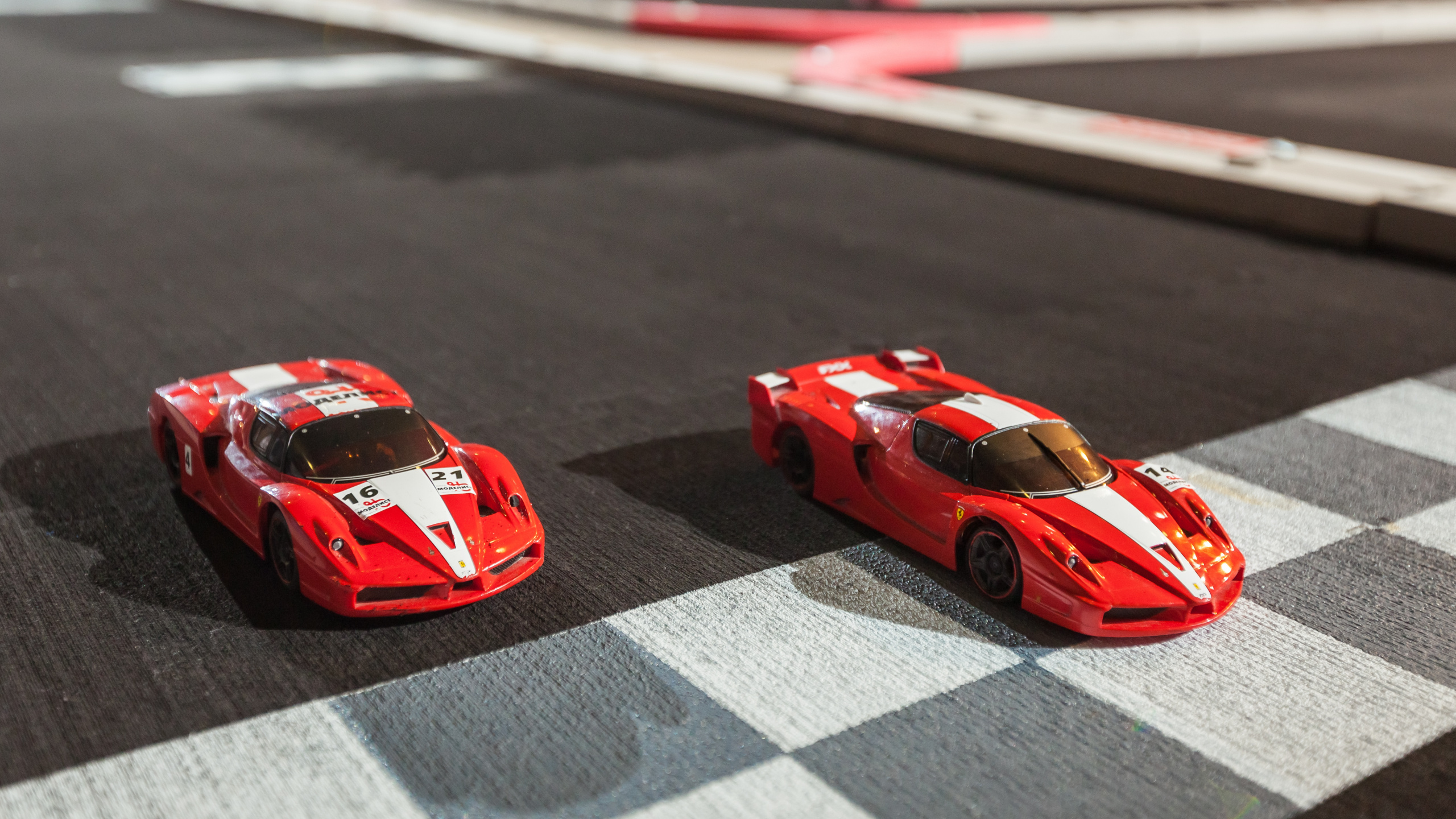 Red Ferrari f 1 on Road. Wallpaper in 2560x1440 Resolution