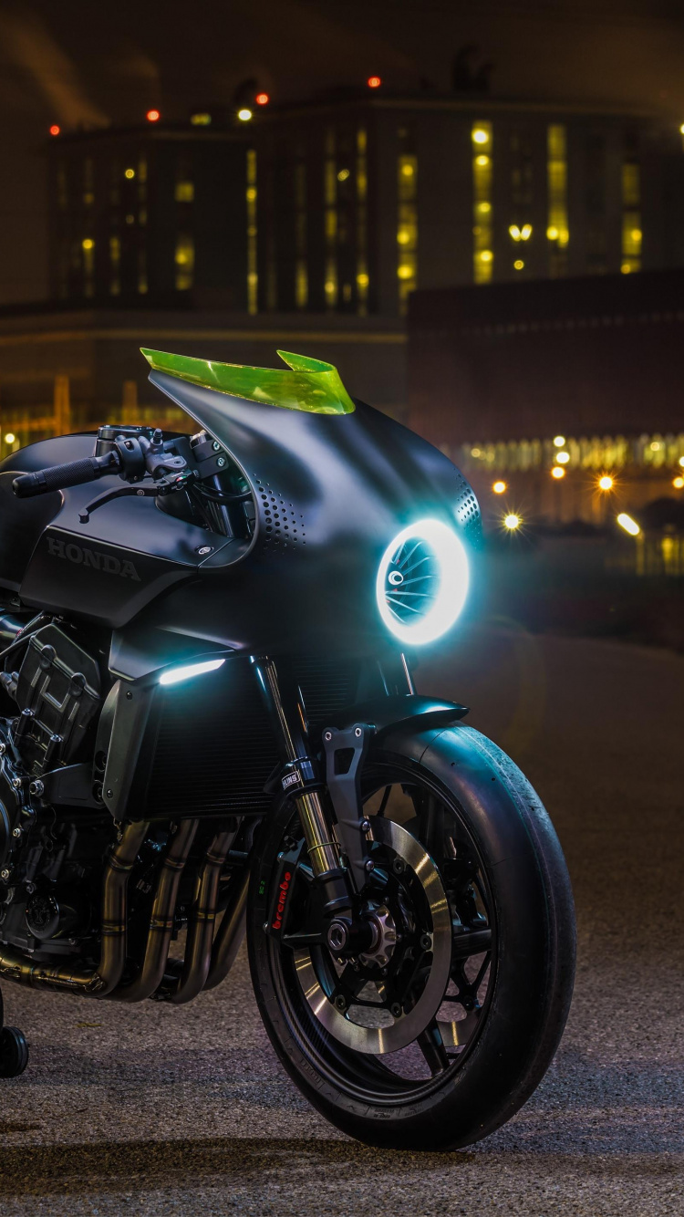 Green and Black Sports Bike on Road During Night Time. Wallpaper in 750x1334 Resolution