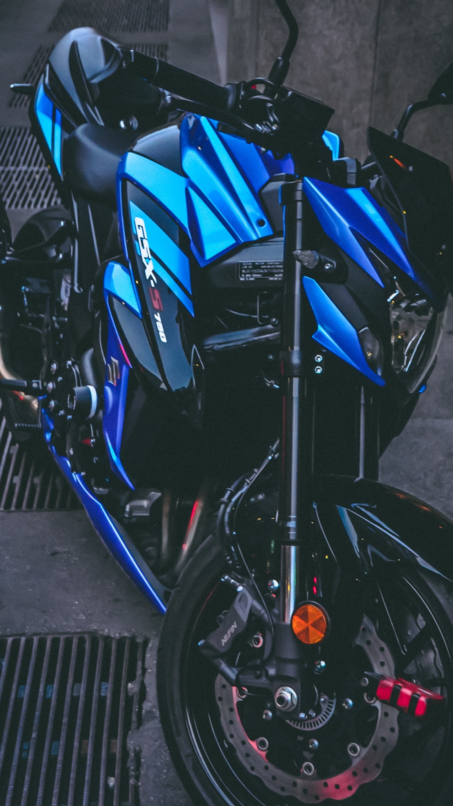 Blue and Black Motorcycle Parked on Gray Concrete Pavement. Wallpaper in 1440x2560 Resolution