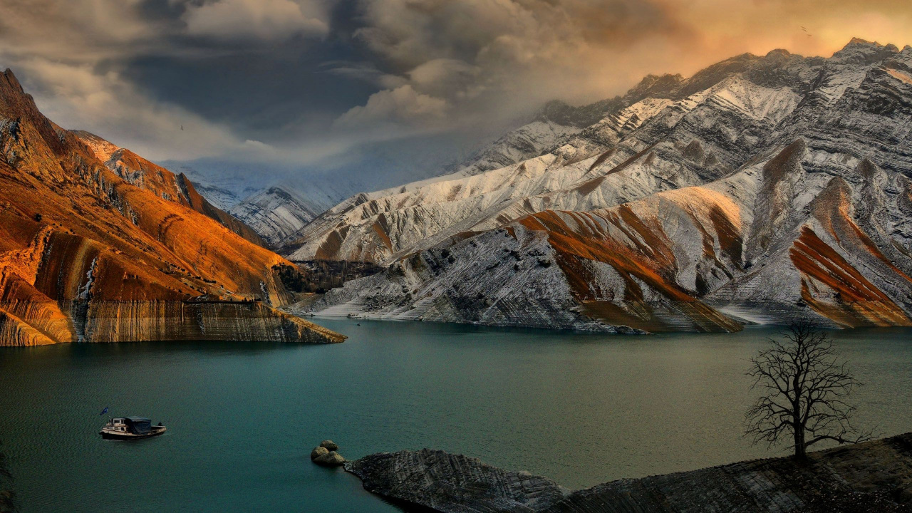 Body of Water Near Mountain Under Cloudy Sky During Daytime. Wallpaper in 1280x720 Resolution