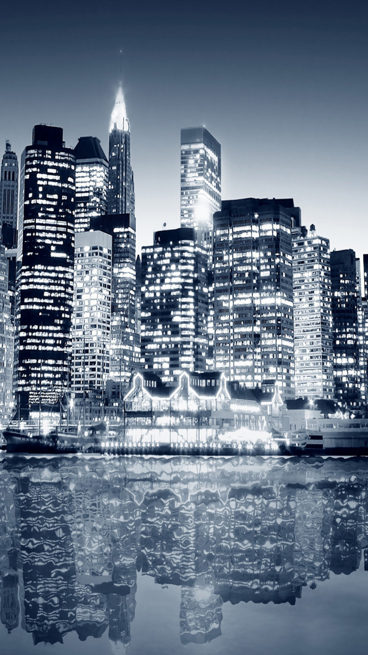 Grayscale Photo of City Skyline. Wallpaper in 750x1334 Resolution
