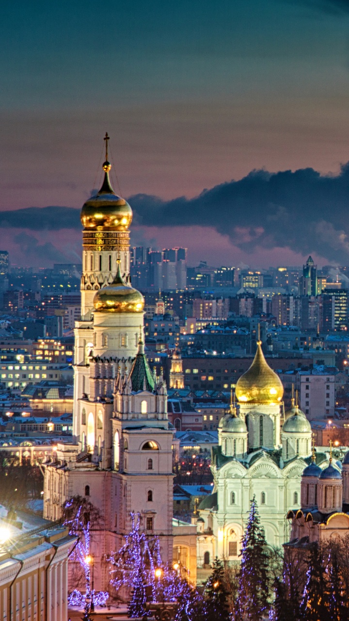 White and Brown Concrete Building During Night Time. Wallpaper in 720x1280 Resolution