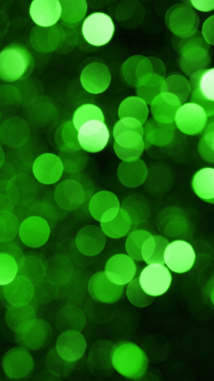 Grüne Und Weiße Bokeh-Lichter. Wallpaper in 720x1280 Resolution