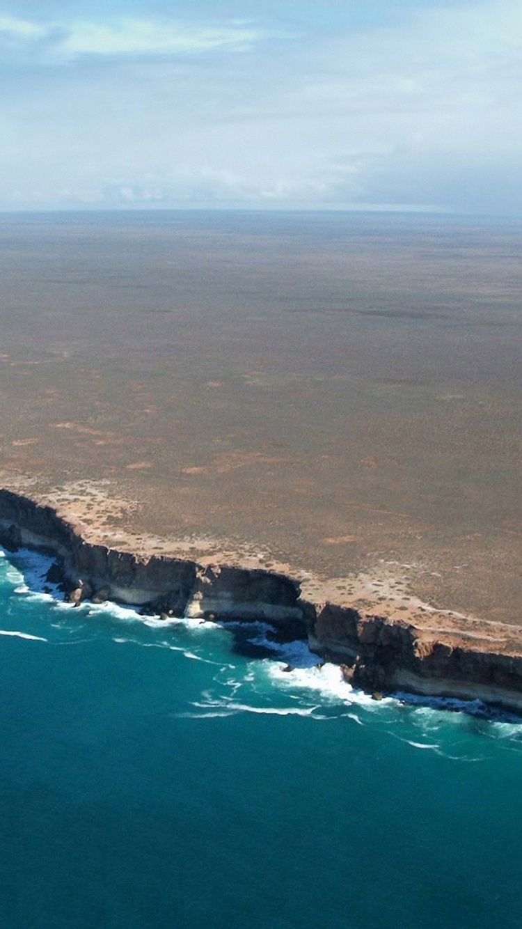 Aerial View of Island During Daytime. Wallpaper in 750x1334 Resolution