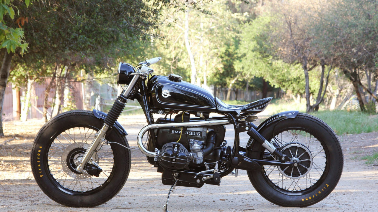 Black Standard Motorcycle Parked on Gray Concrete Road During Daytime. Wallpaper in 1280x720 Resolution