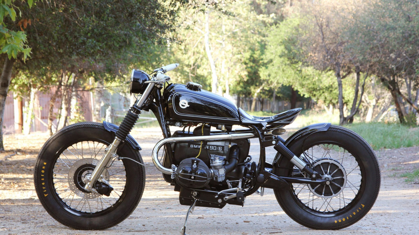 Black Standard Motorcycle Parked on Gray Concrete Road During Daytime. Wallpaper in 1366x768 Resolution