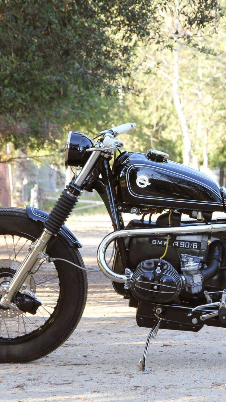 Black Standard Motorcycle Parked on Gray Concrete Road During Daytime. Wallpaper in 750x1334 Resolution