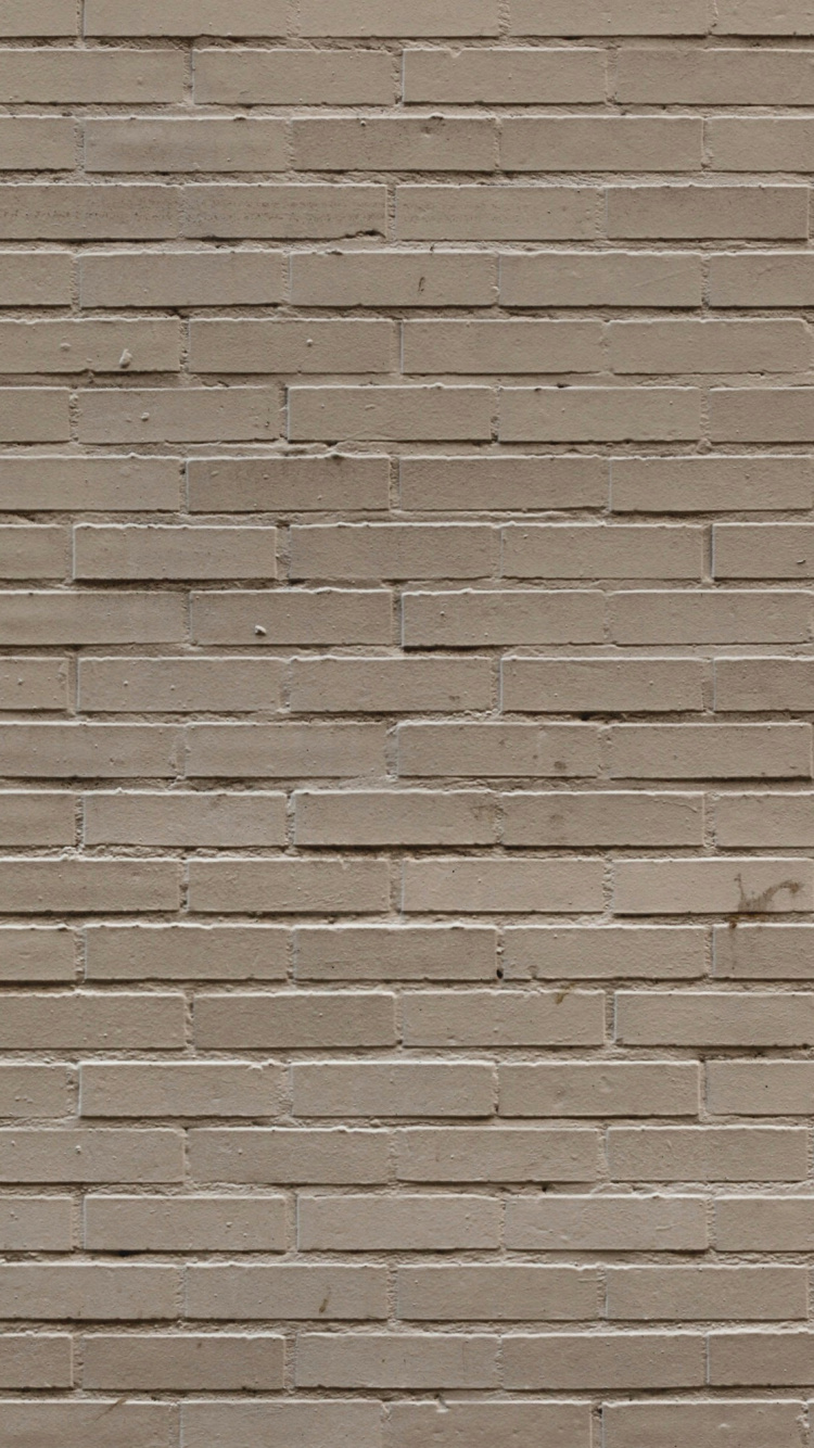 Pared de Ladrillo Marrón Durante el Día.. Wallpaper in 750x1334 Resolution