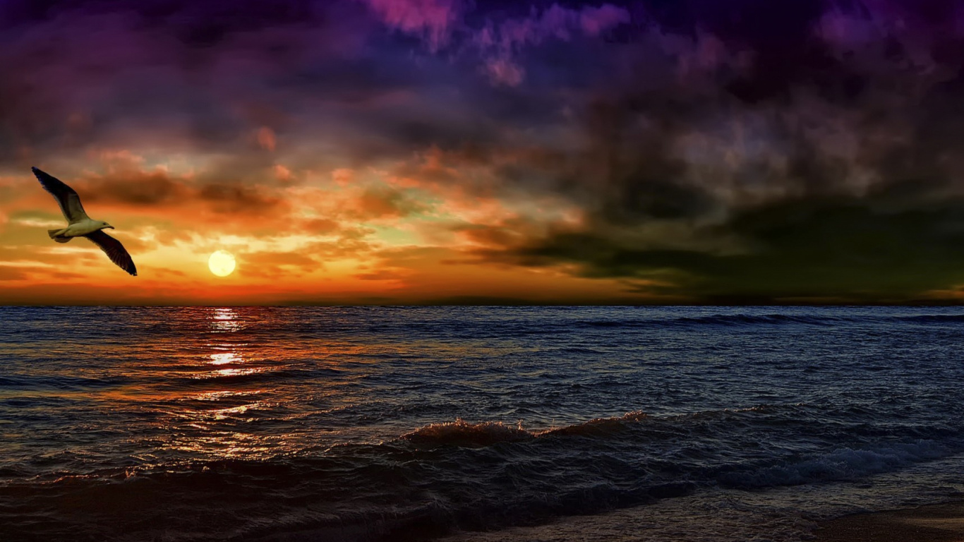 Ocean Waves Crashing on Shore During Sunset. Wallpaper in 1366x768 Resolution