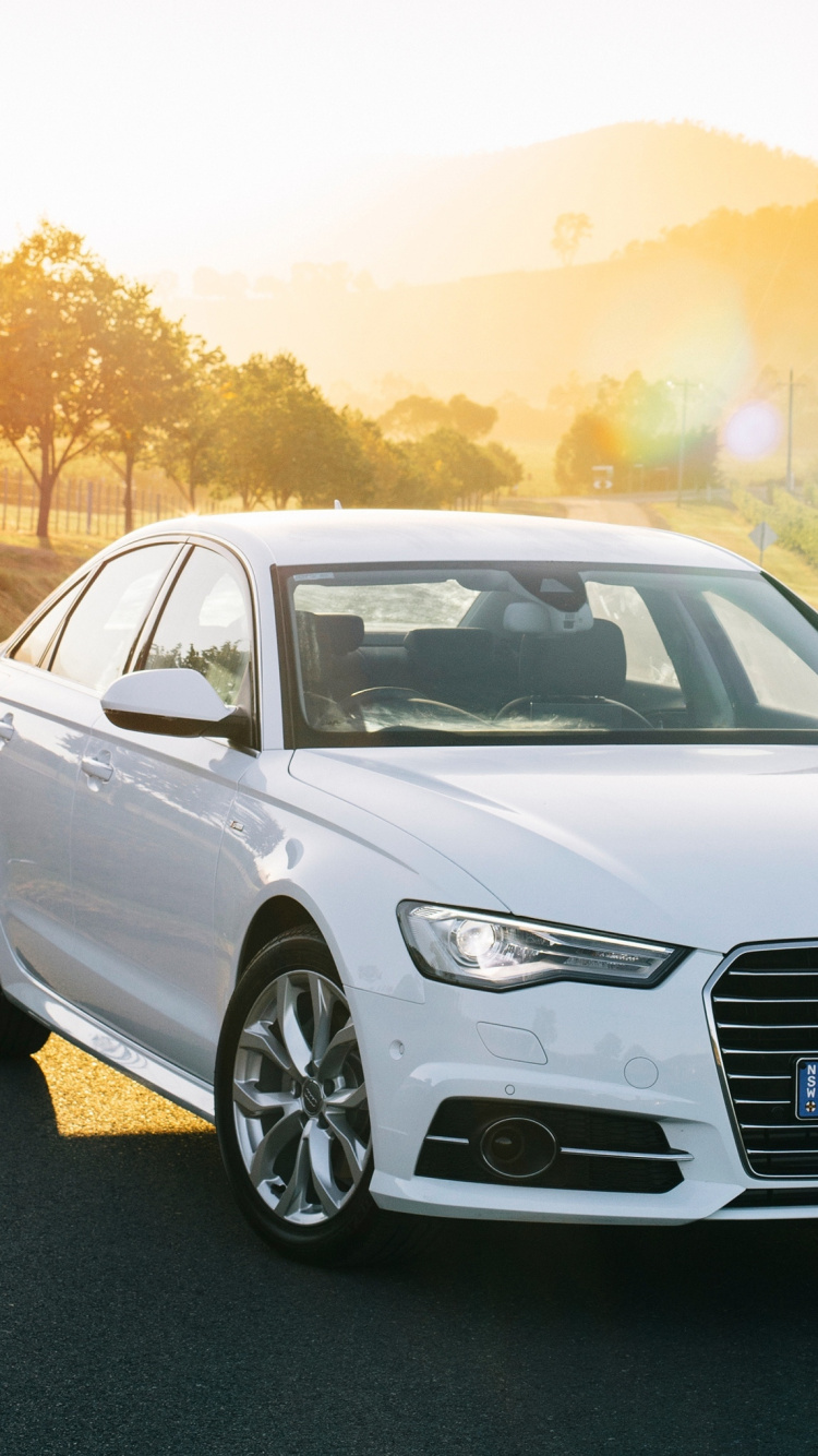 White Audi a 4 Sedan on Road During Daytime. Wallpaper in 750x1334 Resolution