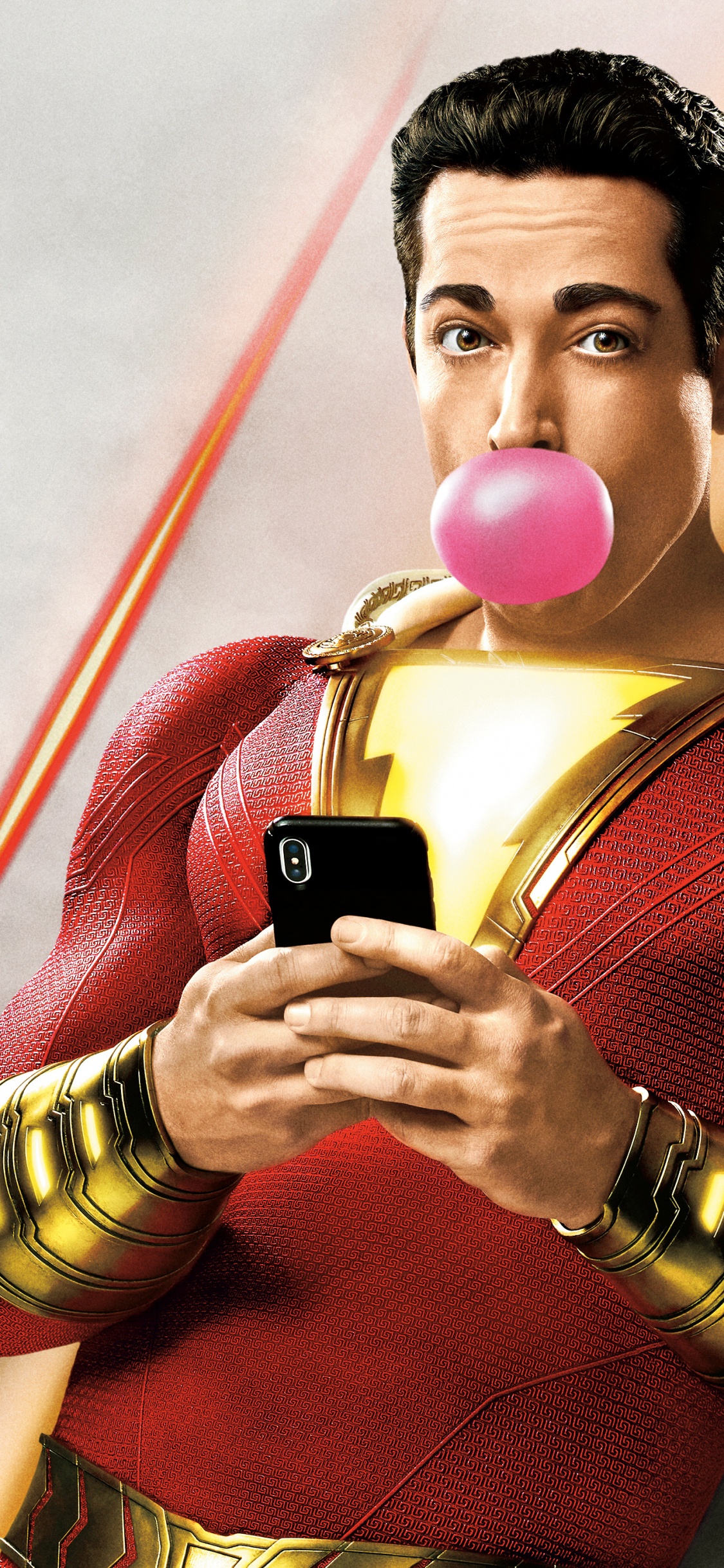 Hombre de Suéter Rojo Con Smartphone Negro. Wallpaper in 1125x2436 Resolution