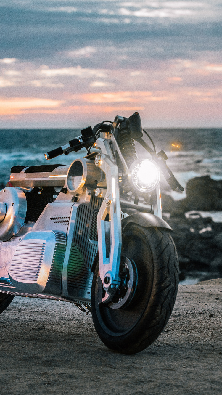 Black and White Sports Bike on Beach Shore During Sunset. Wallpaper in 750x1334 Resolution
