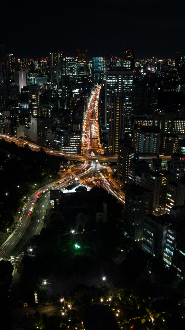 Vue Aérienne de la Ville Pendant la Nuit. Wallpaper in 750x1334 Resolution