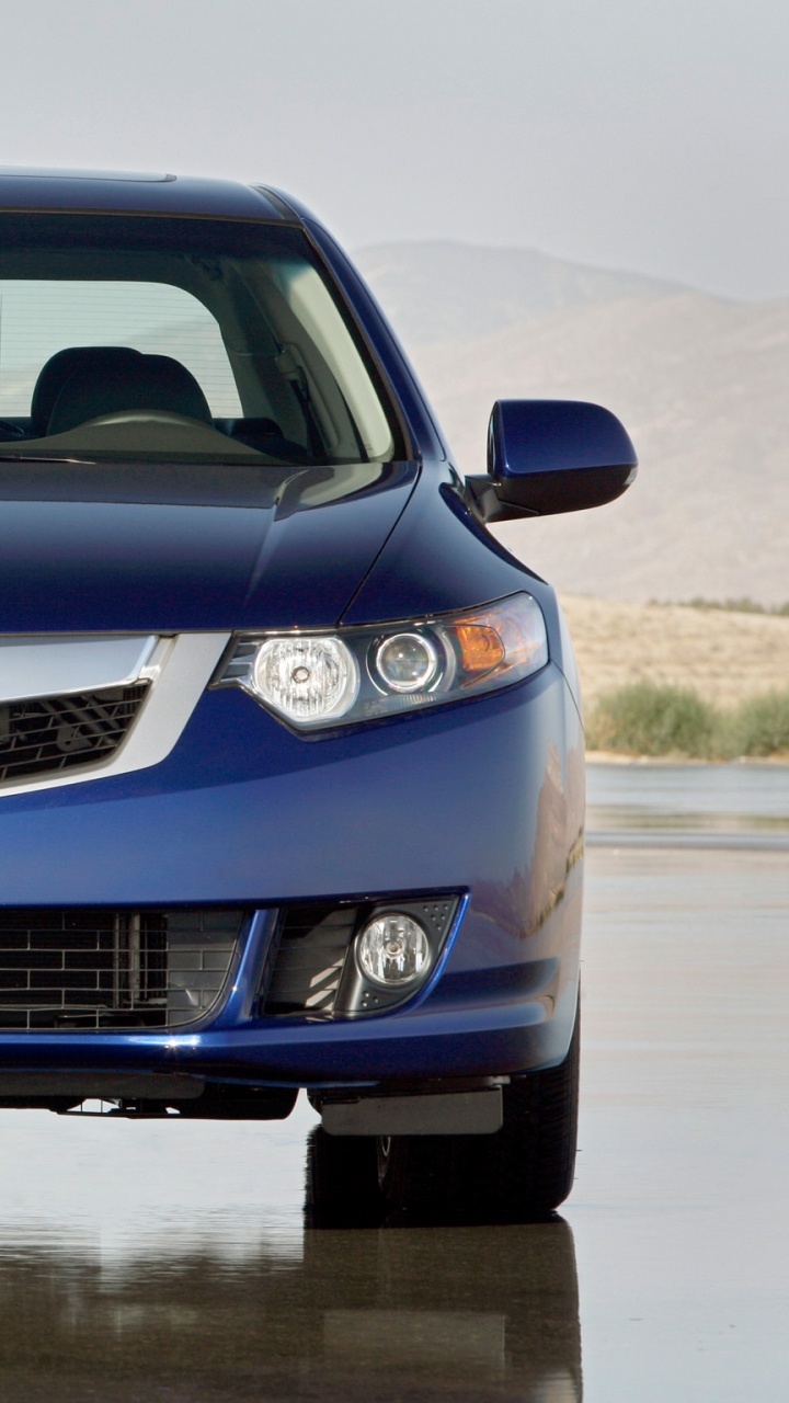 Blue Mercedes Benz Car on Snow Covered Ground During Daytime. Wallpaper in 720x1280 Resolution