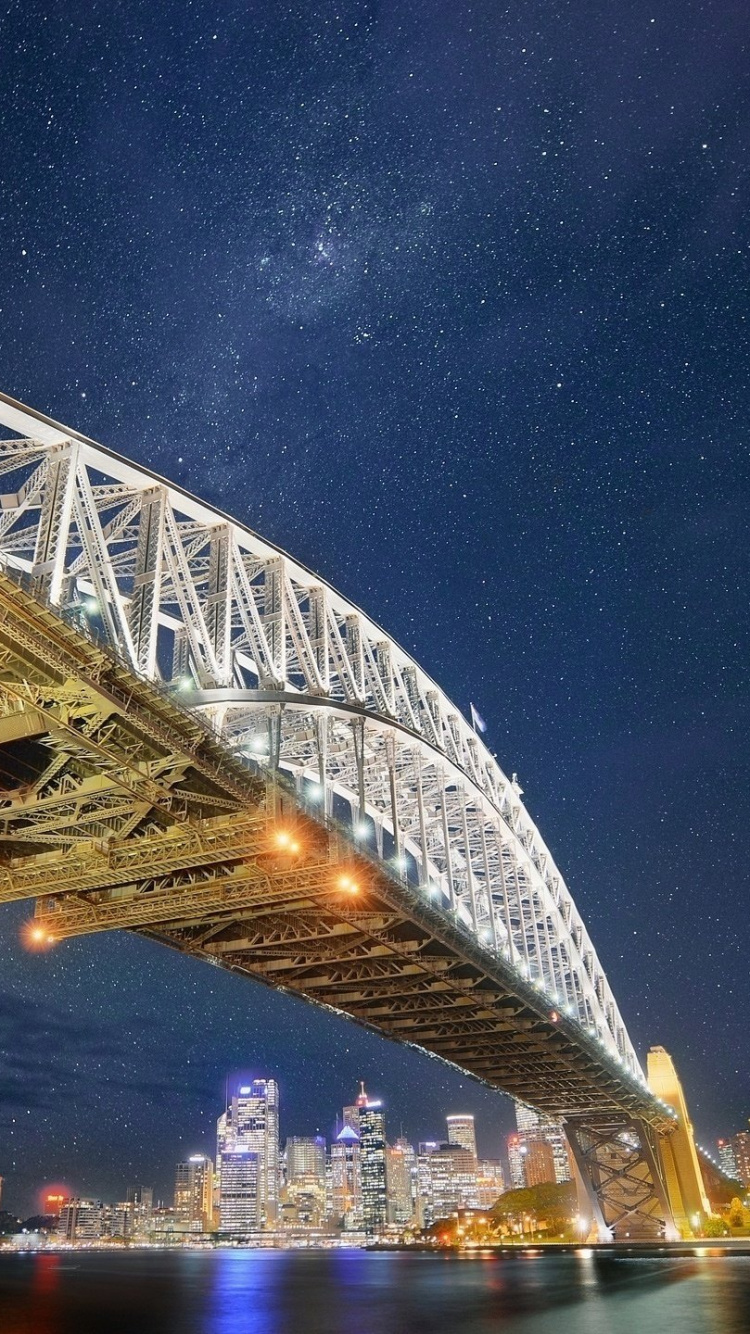 Pont en Acier Gris Sous Ciel Bleu Pendant la Nuit. Wallpaper in 750x1334 Resolution