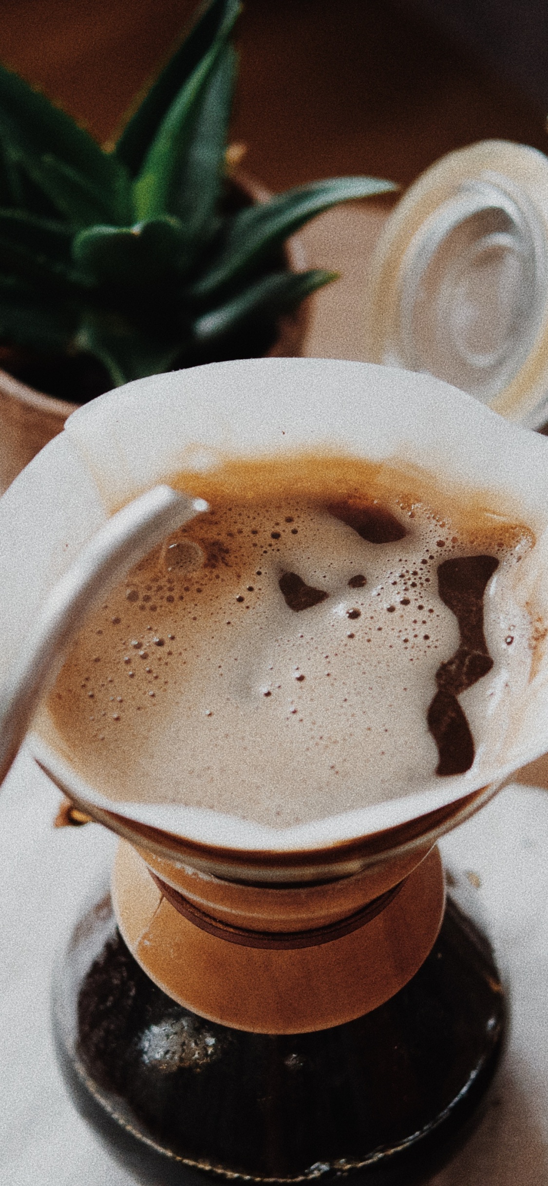 White Ceramic Mug on Brown Wooden Table. Wallpaper in 1125x2436 Resolution