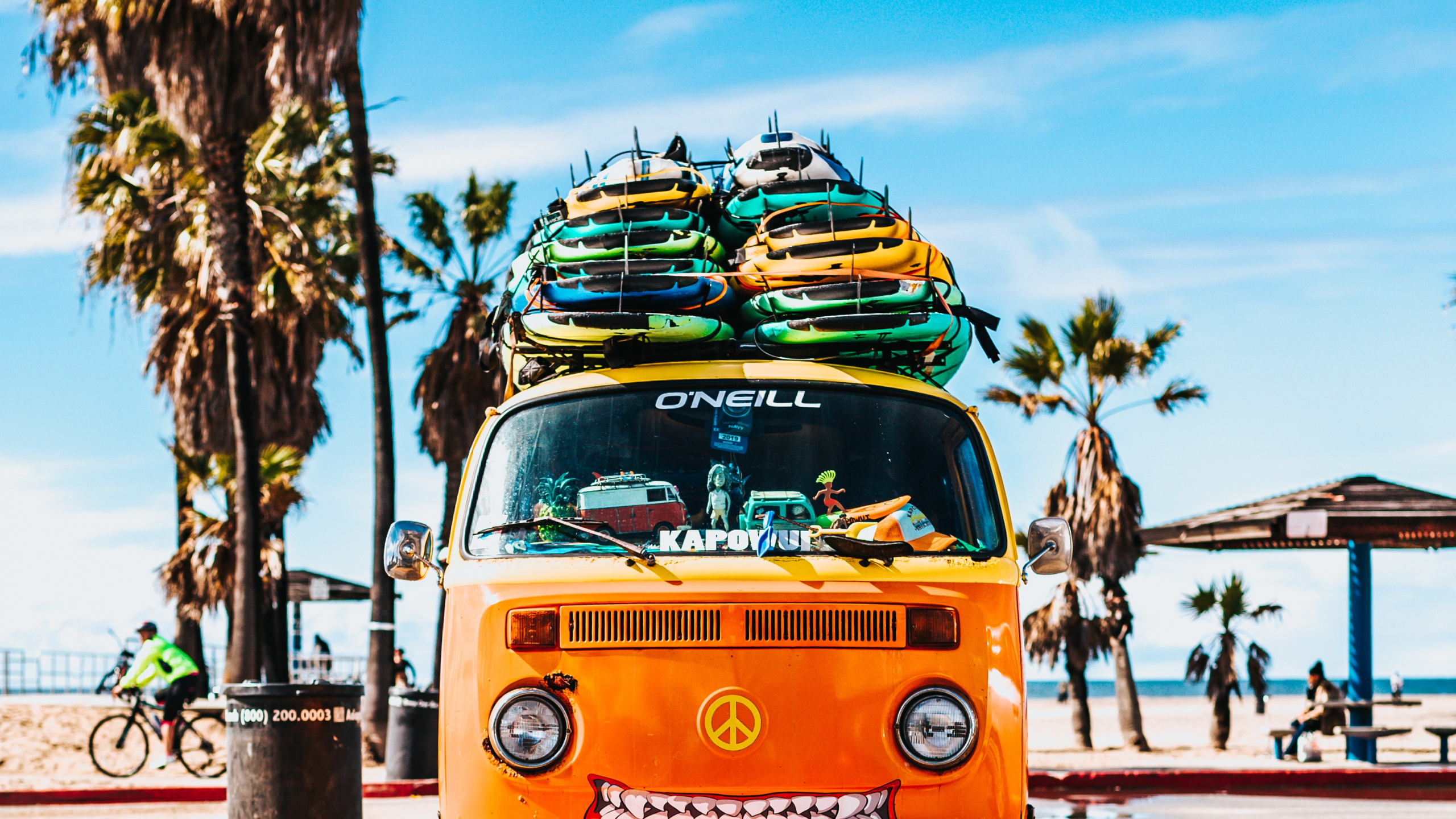 Yellow and Blue Volkswagen T-2 Van on Gray Concrete Road During Daytime. Wallpaper in 2560x1440 Resolution