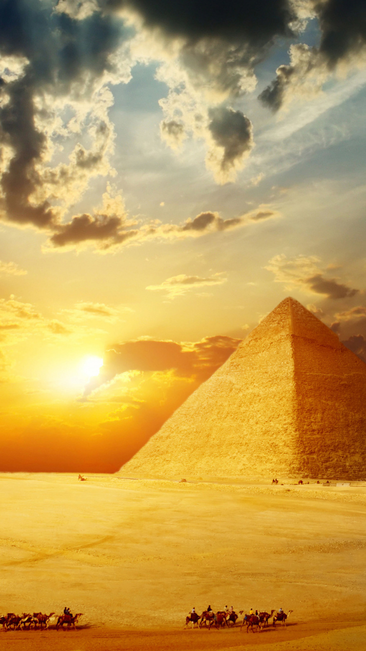 Pyramide Brune Sur le Sable Blanc Pendant le Coucher du Soleil. Wallpaper in 750x1334 Resolution