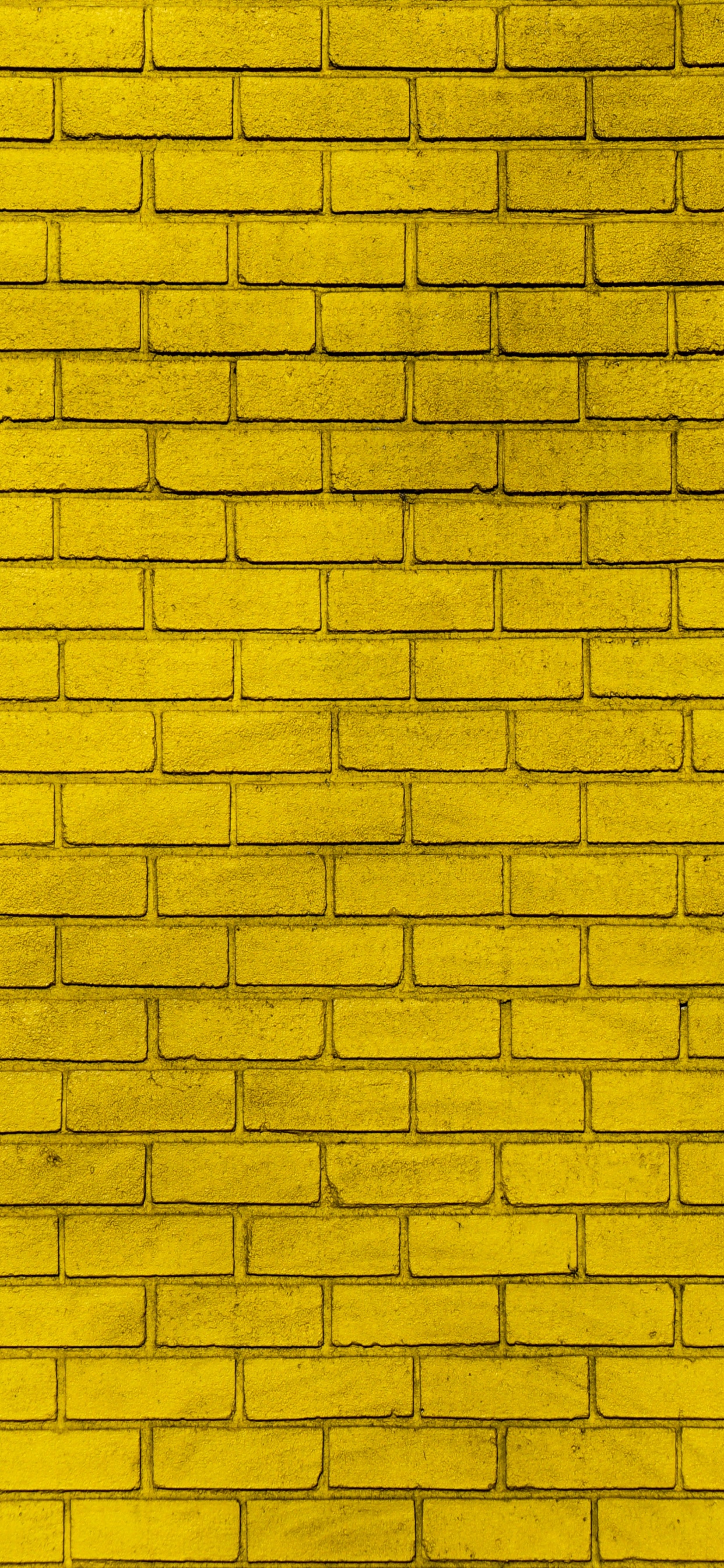 Yellow and Black Brick Wall. Wallpaper in 1242x2688 Resolution