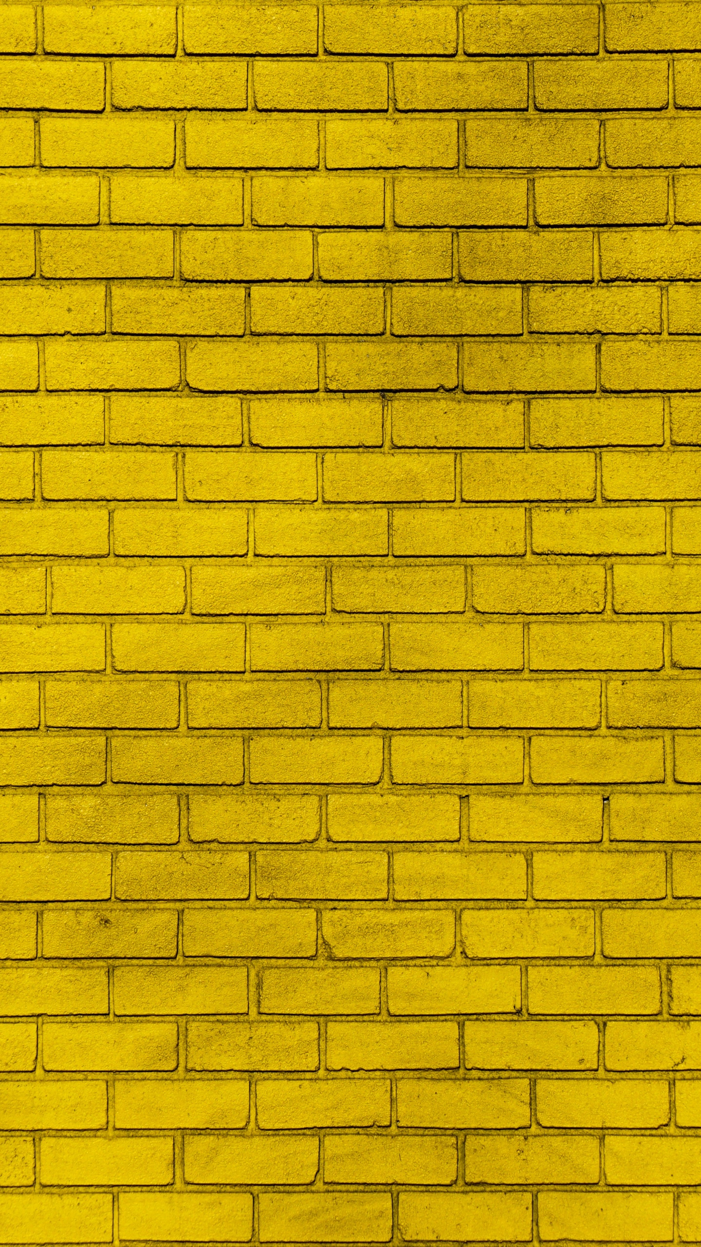 Yellow and Black Brick Wall. Wallpaper in 1440x2560 Resolution