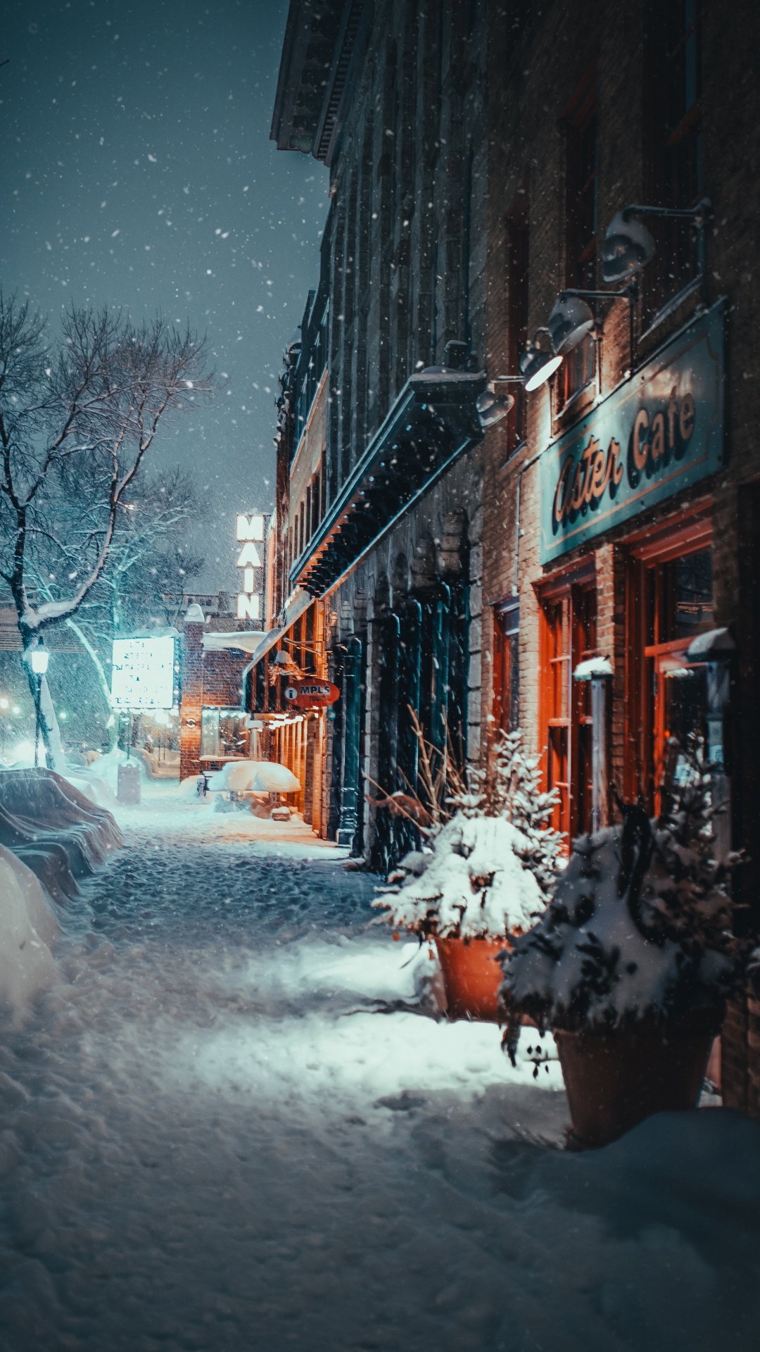 Schneebedeckte Straße Zwischen Gebäuden Tagsüber. Wallpaper in 1080x1920 Resolution