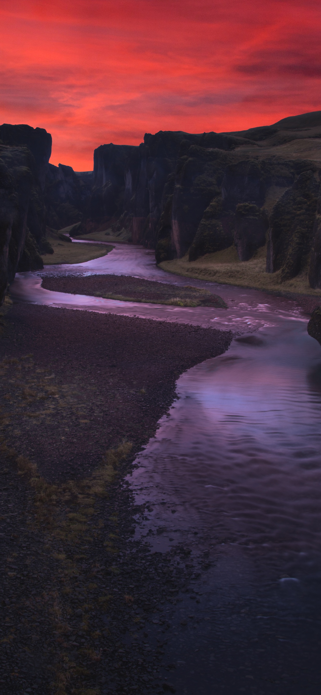 Body of Water Between Mountain During Sunset. Wallpaper in 1242x2688 Resolution