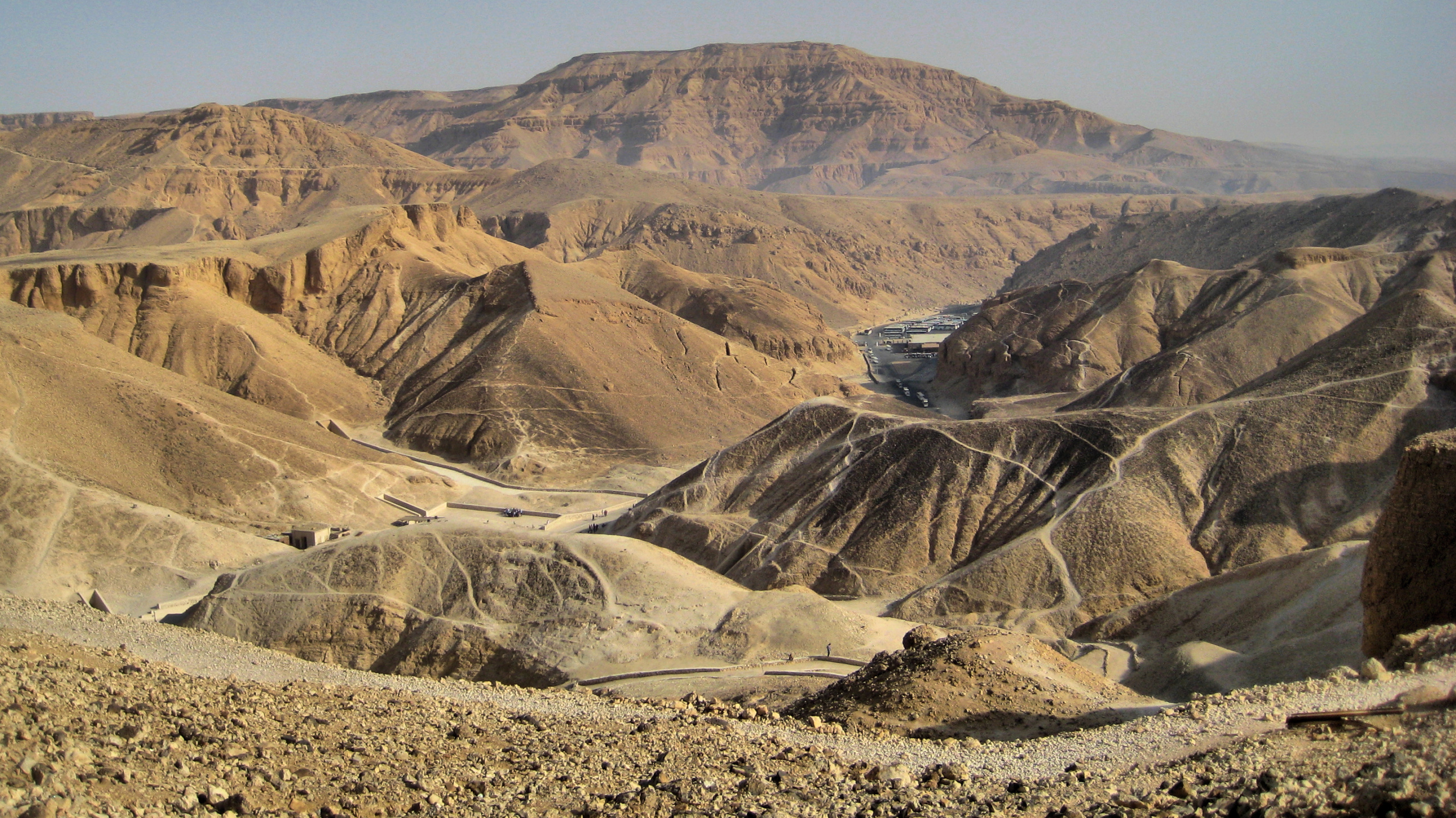 Brown and Gray Mountains Under Blue Sky During Daytime. Wallpaper in 2560x1440 Resolution