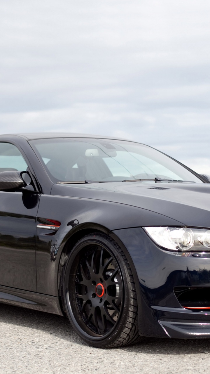 BMW M 3 Coupe Negro Sobre Carretera de Asfalto Gris. Wallpaper in 720x1280 Resolution