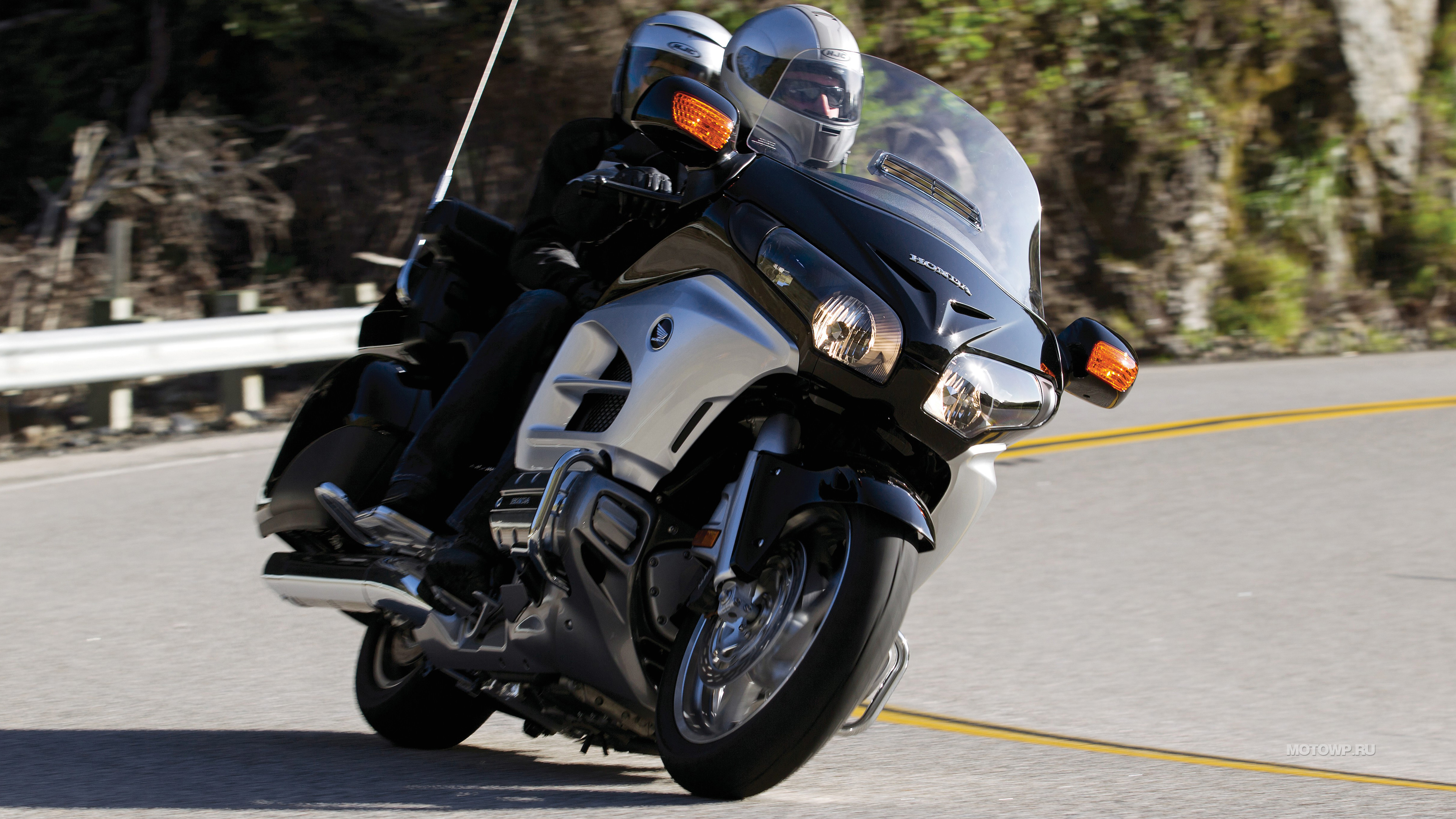 Man in Black Helmet Riding Black Sports Bike. Wallpaper in 3840x2160 Resolution