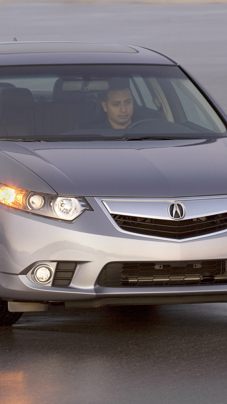 Gray Honda Sedan on Gray Asphalt Road. Wallpaper in 750x1334 Resolution