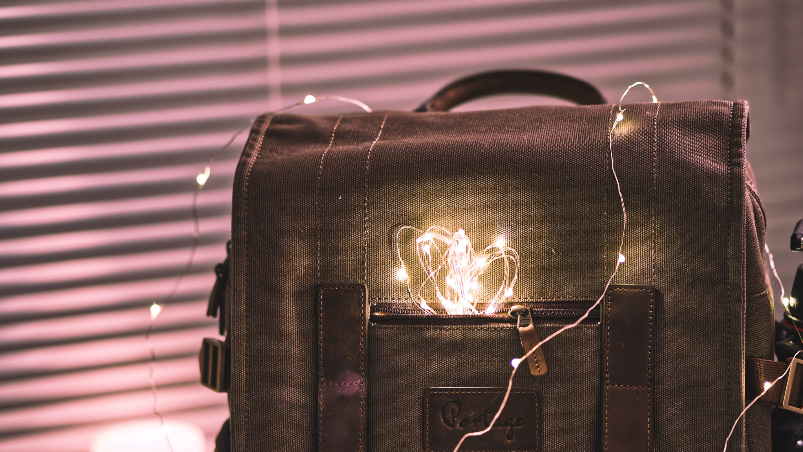 Black Leather Handbag on Table. Wallpaper in 2560x1440 Resolution