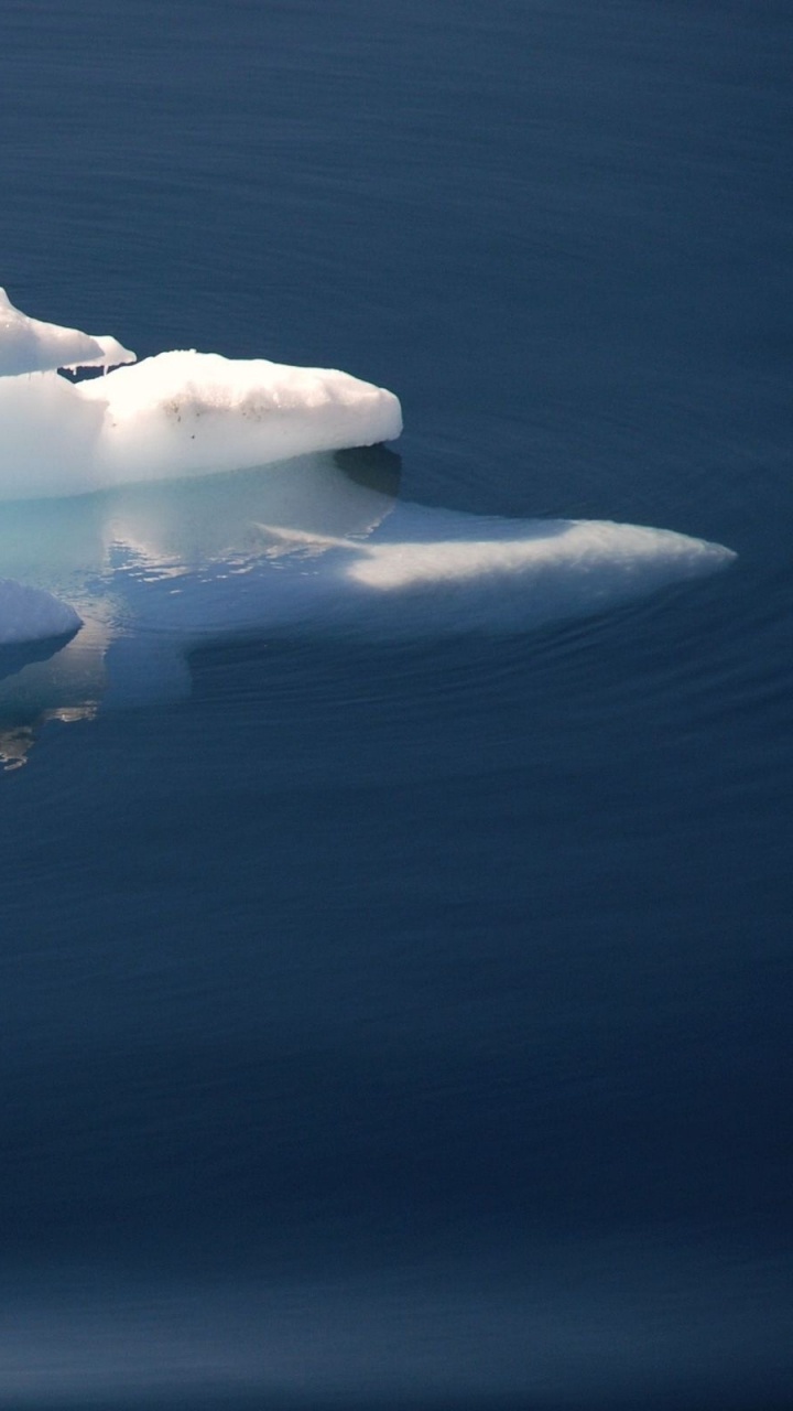 White Ice on Body of Water. Wallpaper in 720x1280 Resolution