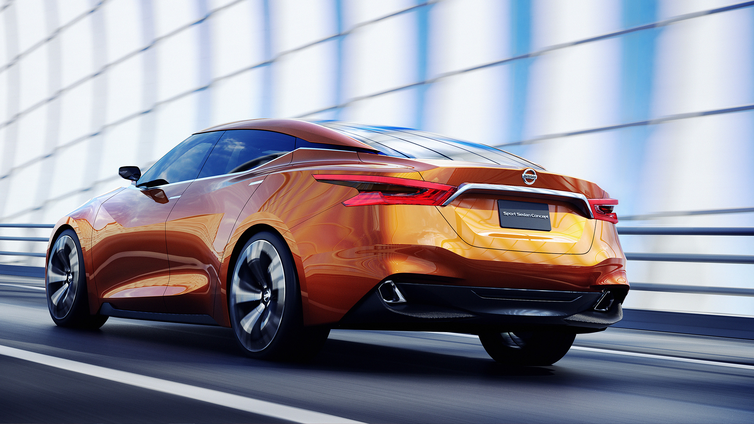 Orange Porsche 911 Parked Beside White Wall. Wallpaper in 2560x1440 Resolution