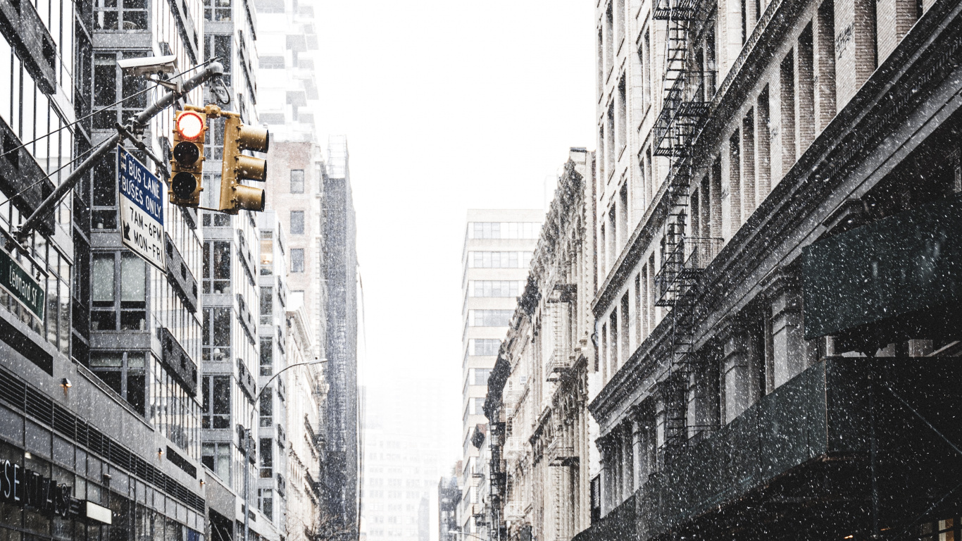 People Walking on Street Between High Rise Buildings During Daytime. Wallpaper in 1366x768 Resolution