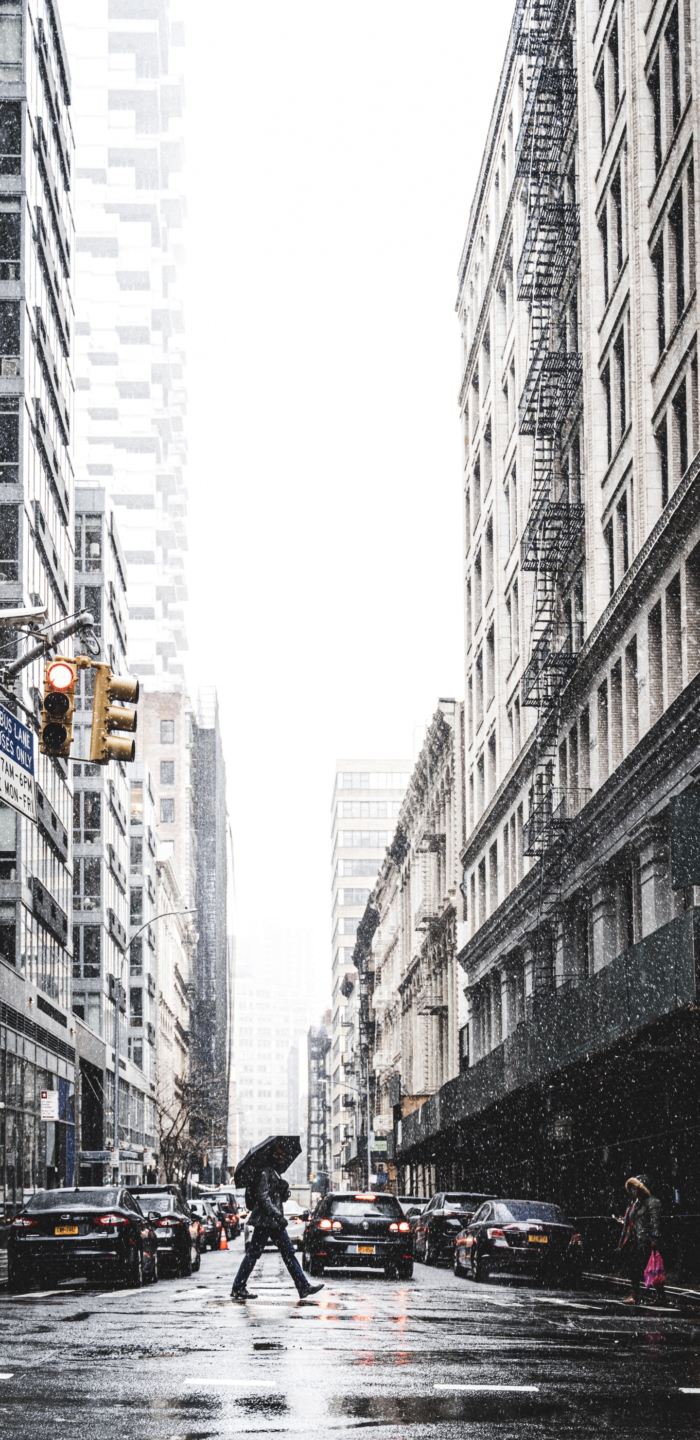 People Walking on Street Between High Rise Buildings During Daytime. Wallpaper in 1440x2960 Resolution