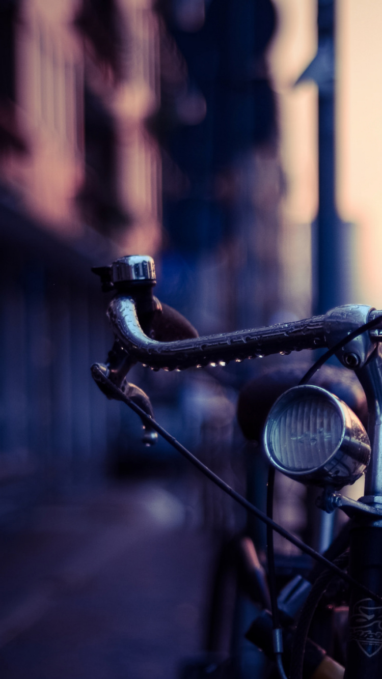Black Bicycle in Front of Brown Brick Building During Daytime. Wallpaper in 750x1334 Resolution