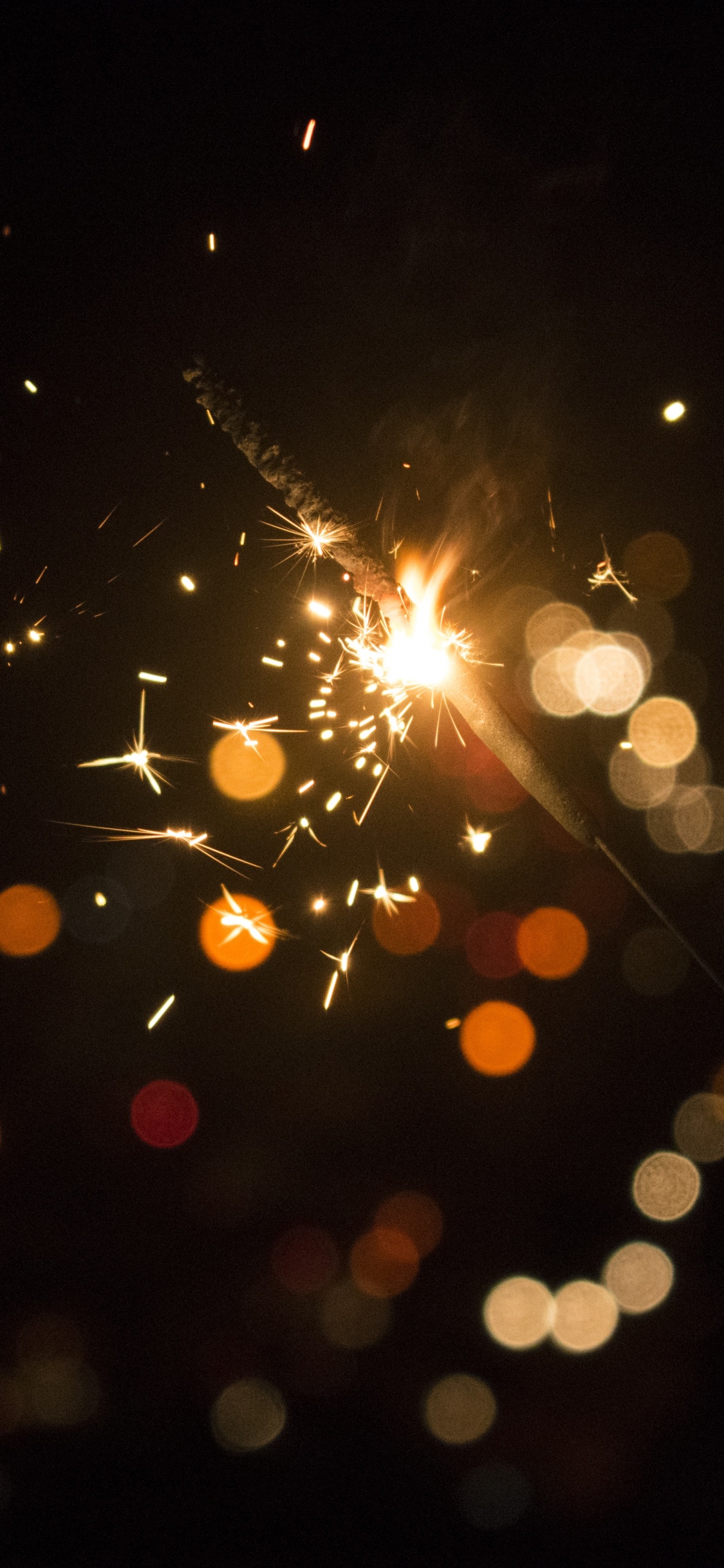 Gelbes Und Rotes Licht-Bokeh. Wallpaper in 1125x2436 Resolution