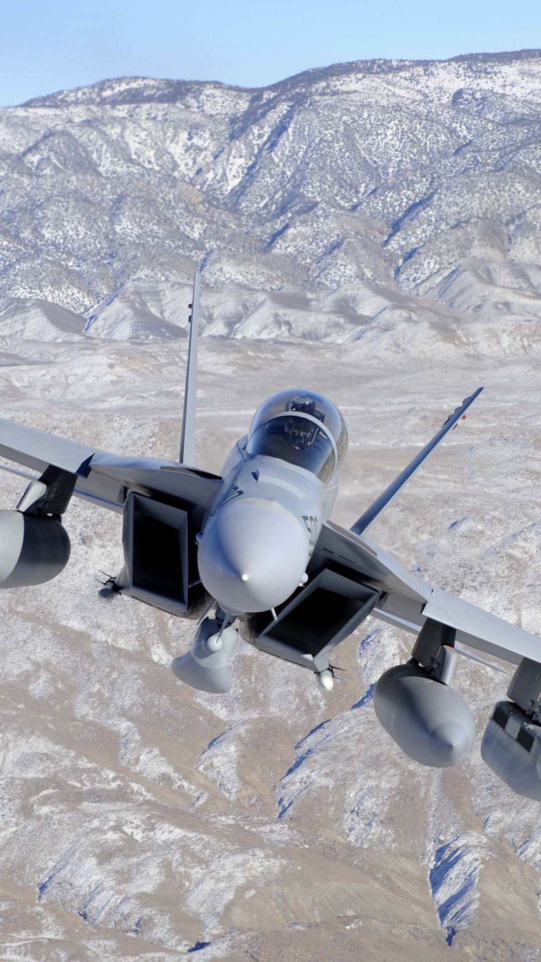 White and Gray Drone Flying Over Snow Covered Mountain During Daytime. Wallpaper in 1080x1920 Resolution