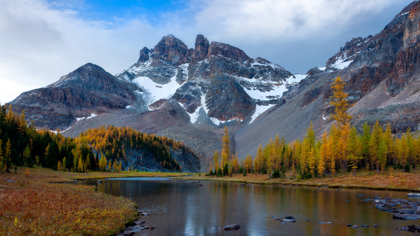 Lake Near Snow Covered Mountain During Daytime. Wallpaper in 1366x768 Resolution