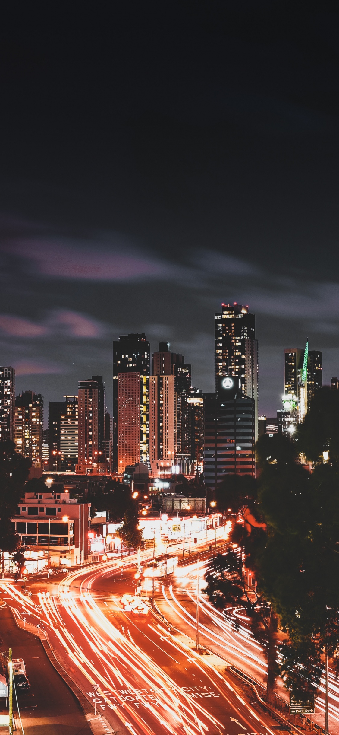 Time Lapse Photography of City During Night Time. Wallpaper in 1125x2436 Resolution