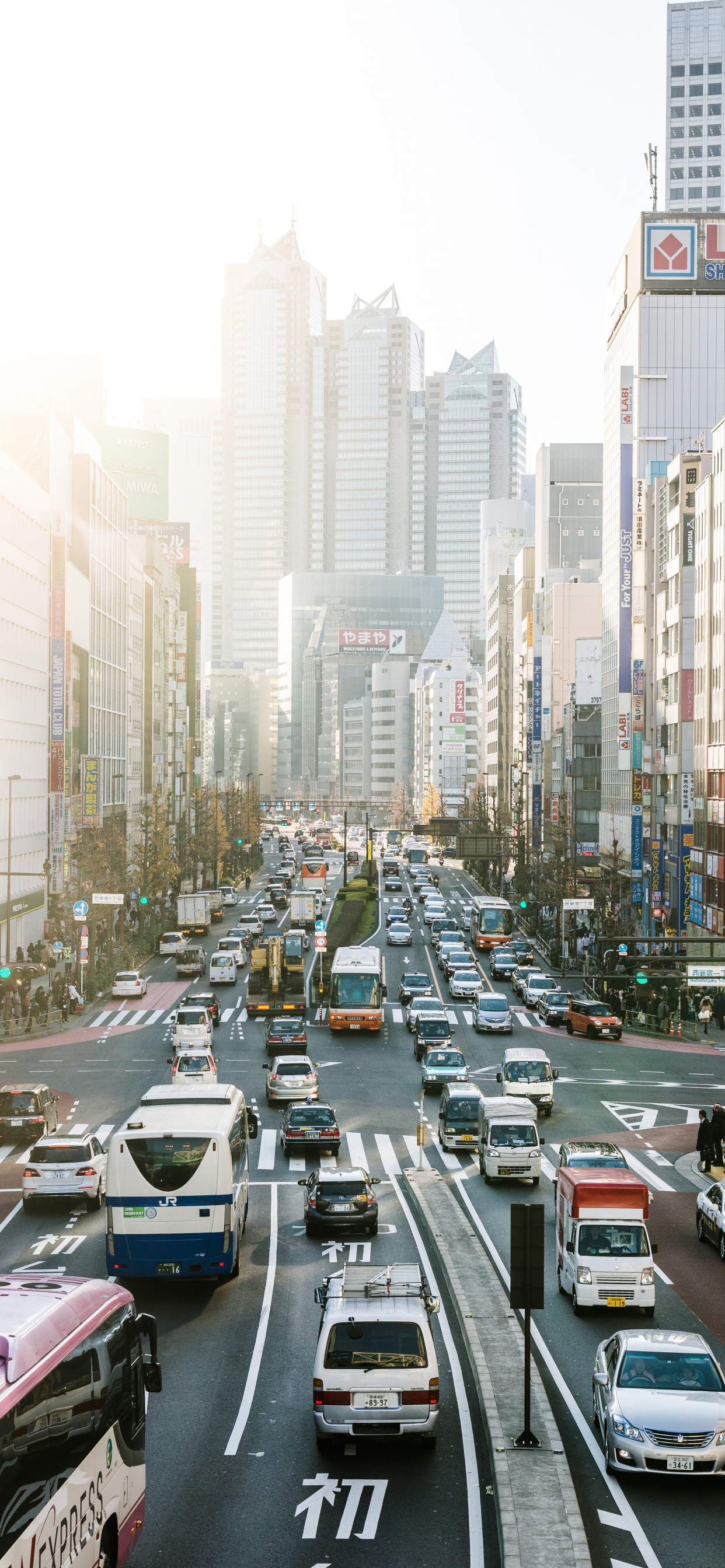 Cars on Road in City During Daytime. Wallpaper in 1242x2688 Resolution