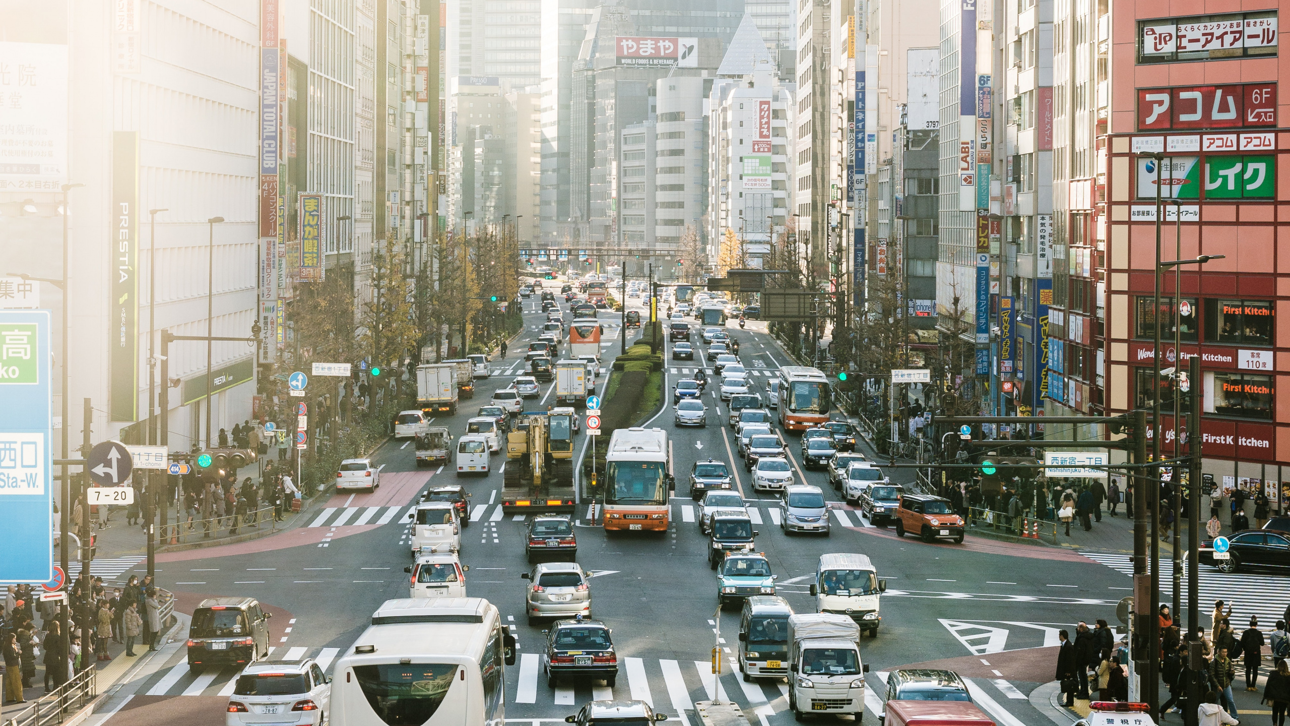 Cars on Road in City During Daytime. Wallpaper in 2560x1440 Resolution