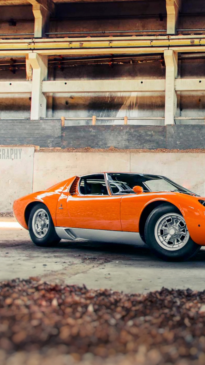 Orange and Black Lamborghini Aventador Parked on Gray Concrete Road During Daytime. Wallpaper in 720x1280 Resolution