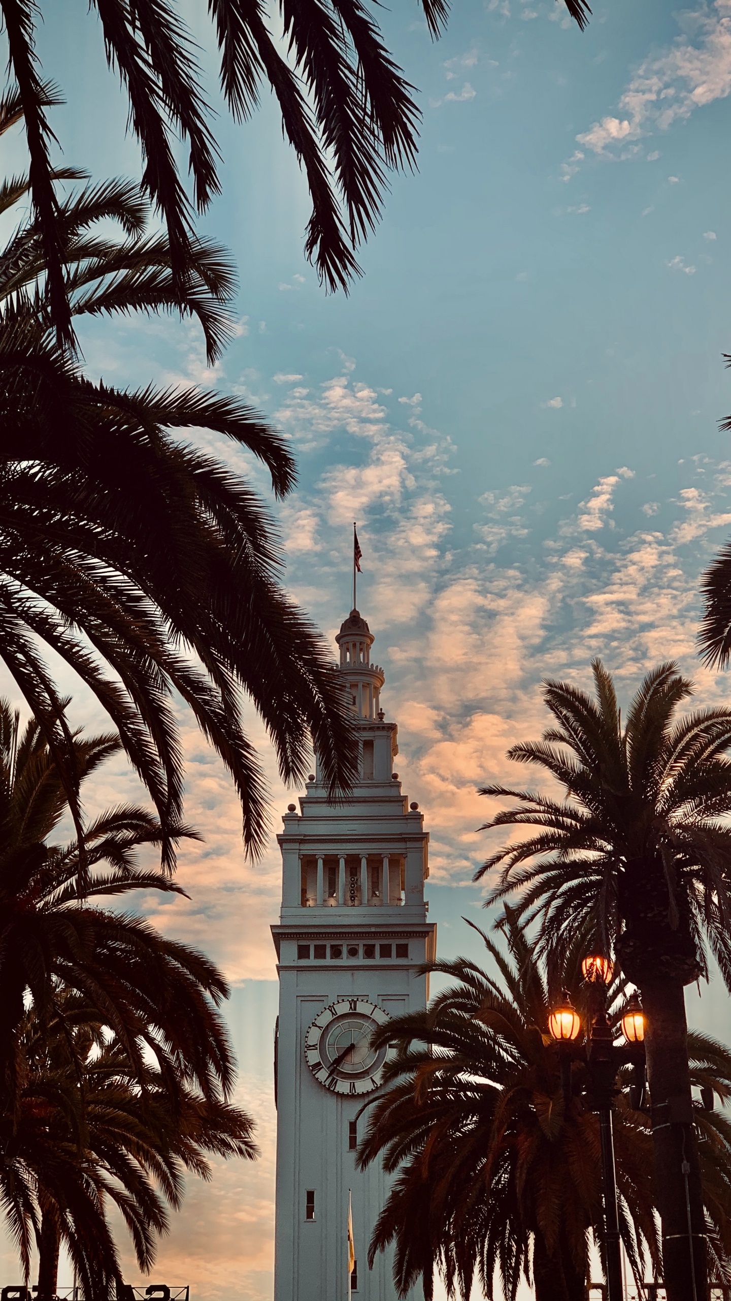 White Concrete Tower With Clock Under Blue Sky and White Clouds During Daytime. Wallpaper in 1440x2560 Resolution