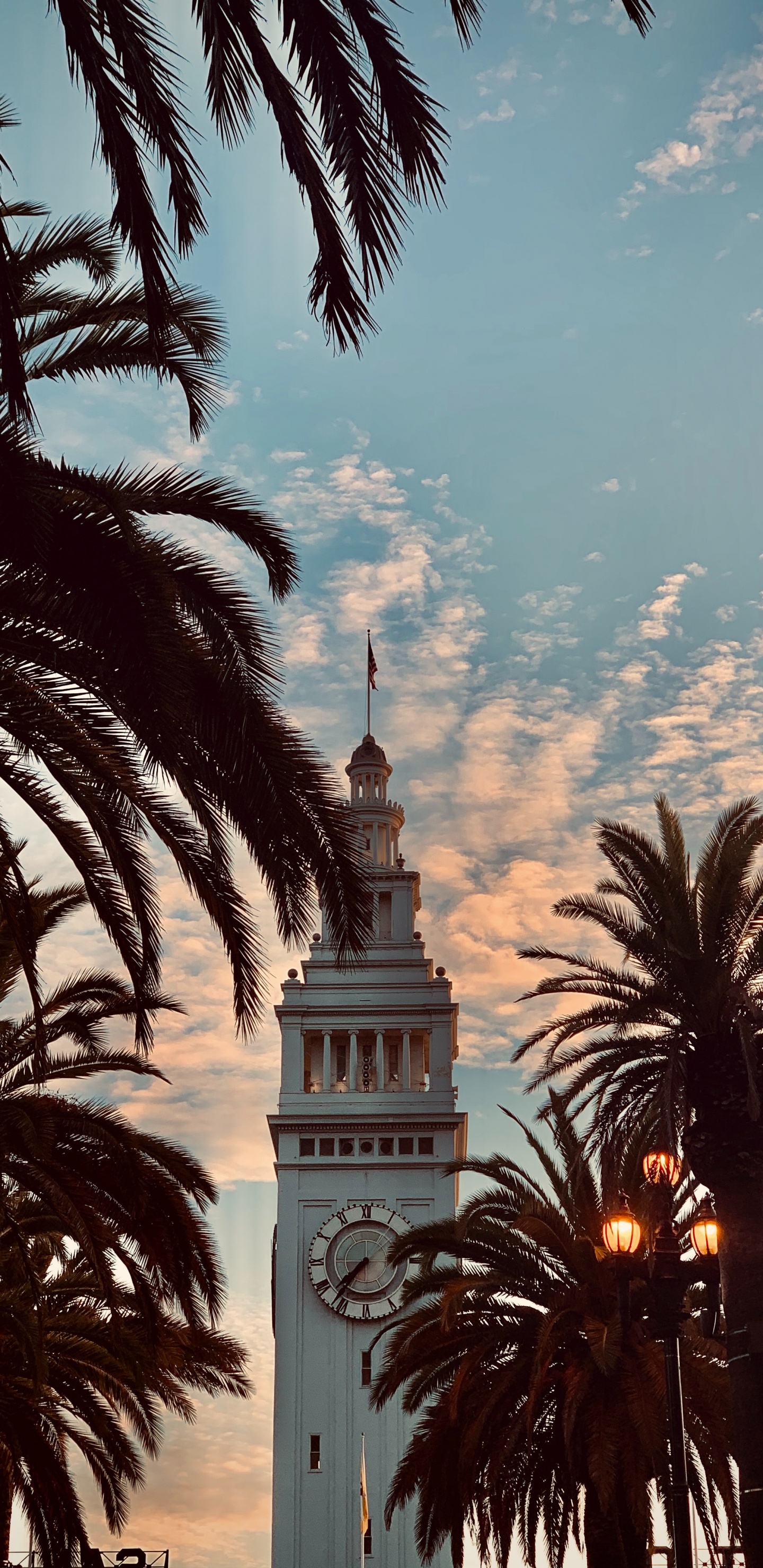 White Concrete Tower With Clock Under Blue Sky and White Clouds During Daytime. Wallpaper in 1440x2960 Resolution