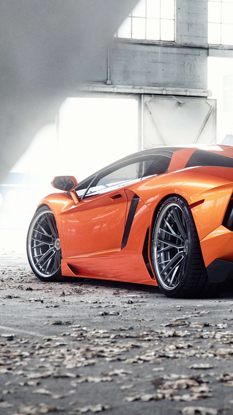 Oranger Lamborghini Aventador Auf Einem Parkplatz Parking. Wallpaper in 750x1334 Resolution