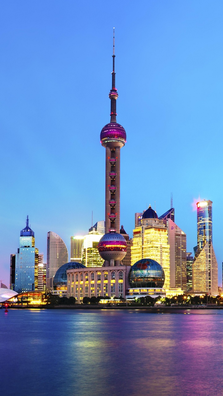 Horizonte de la Ciudad Durante la Noche. Wallpaper in 720x1280 Resolution