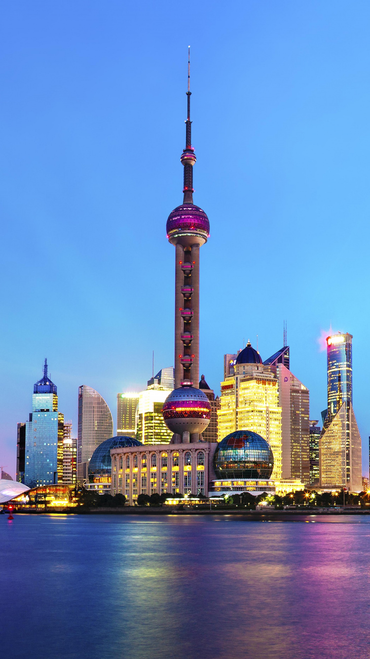 Horizon de la Ville Pendant la Nuit. Wallpaper in 750x1334 Resolution